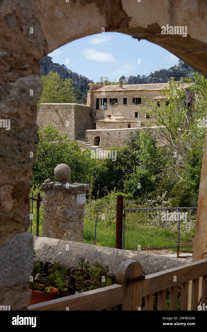 Bunyola, Mallorca, Spain. Alaro,Orient depicting the old village through an archway. Stock Photo