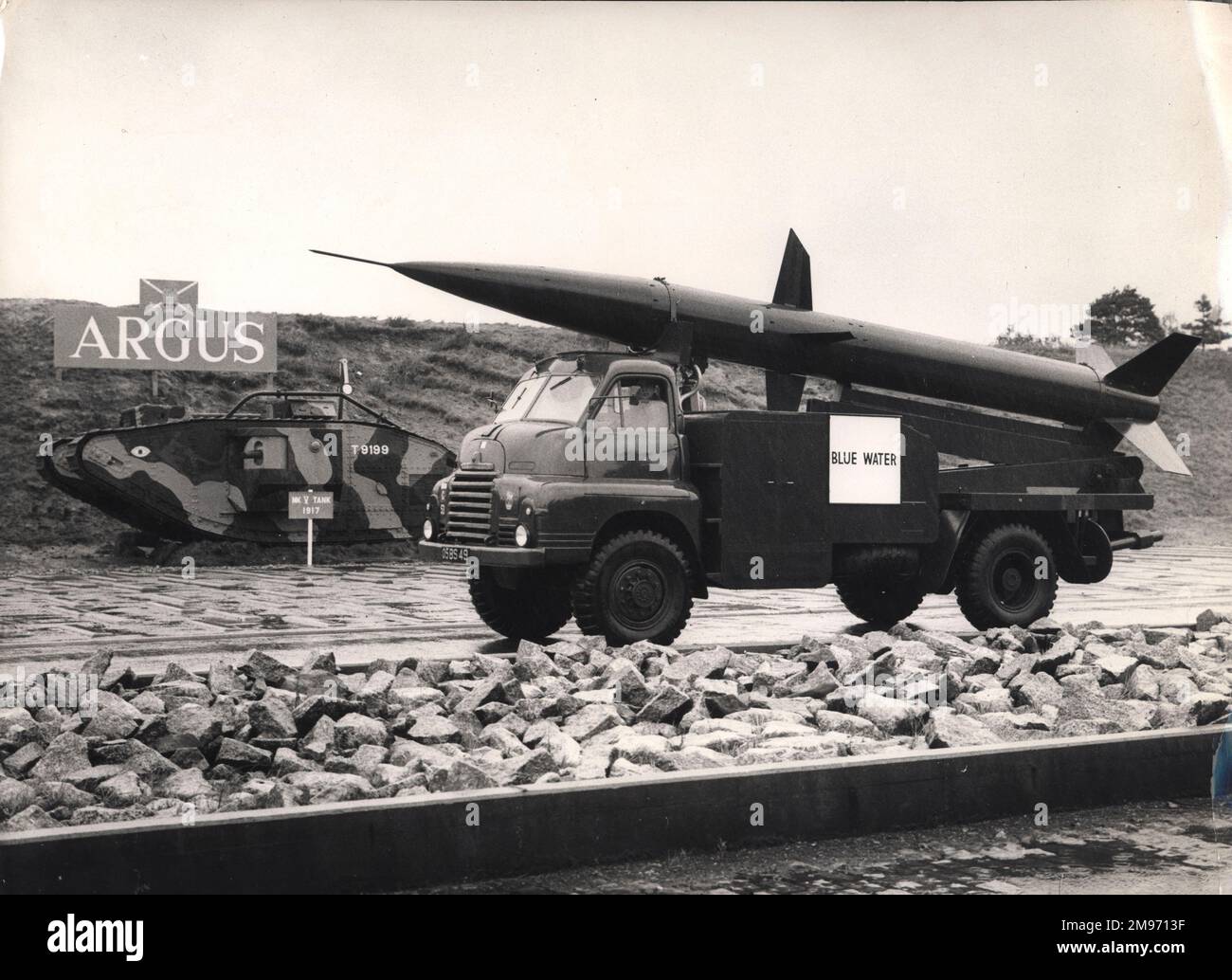 The English Electric Blue Water surface-to-surface missile is carried on, and launched from, a standard three-ton Bedford 4 x 4 truck. It is seen here at the Fighting Vehicles Research and Development Establishment, Chobham, Surrey. In the background is a Mark V tank from WW1. October 1961. Stock Photo