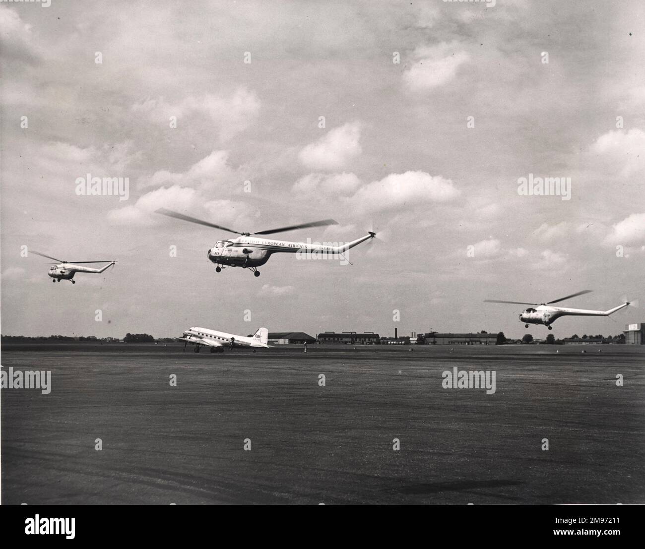 Three Bristol Sycamores (a Mk3 and two Mk3As) of British European Airways inaugurate a scheduled passenger service between Southampton (Eastleigh Airport), London Airport and Northolt. The helicopters are taking of from London Airport. Fares were 30 shillings, single and £2 10 shillings, monthly return. Stock Photo