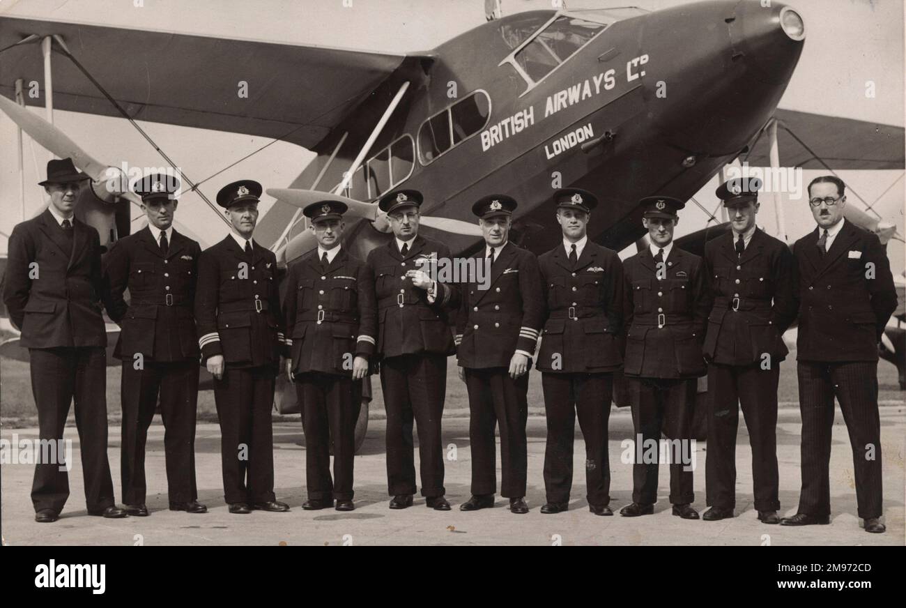 Dh86 Pilots pose in front of a de Havilland DH86 Express Air Liner of ...