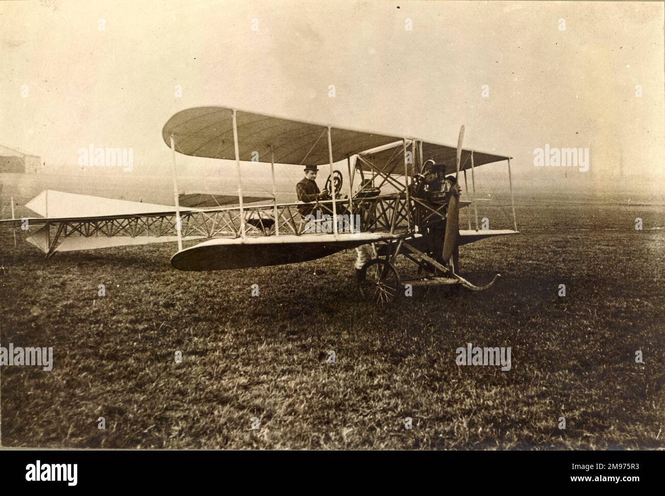 Dufaux Biplane. 1910. Ailerons were attached to the rear struts between the planes. The undercarriage was not sprung. 25hp Anzani engine. Stock Photo