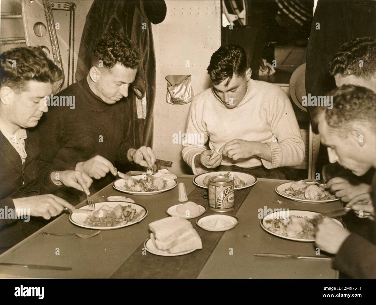 Mealtime on board a Short Sunderland. Stock Photo