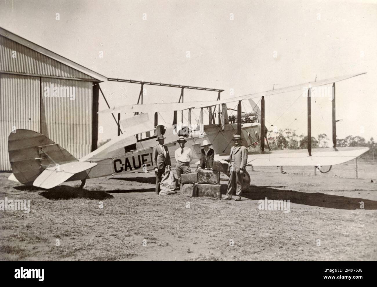Arrival of the first de Havilland DH9C, G-AUE?, at Charleville in 1923. Capt G. Mathews, pilot, on left and A.N. Templeton, director, QANTAS Ltd, right. Stock Photo