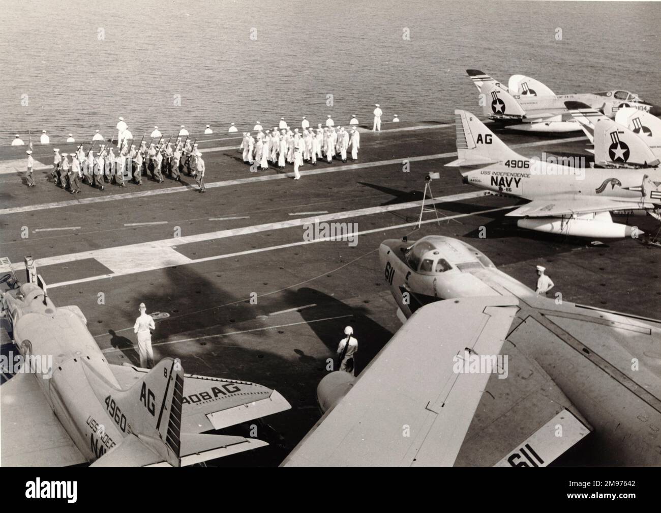 Aircraft on the deck of the USS Independence including Douglas A4D Skyhawks, Douglas F4D Skyrays and a Douglas A3D Skywarrier. Stock Photo