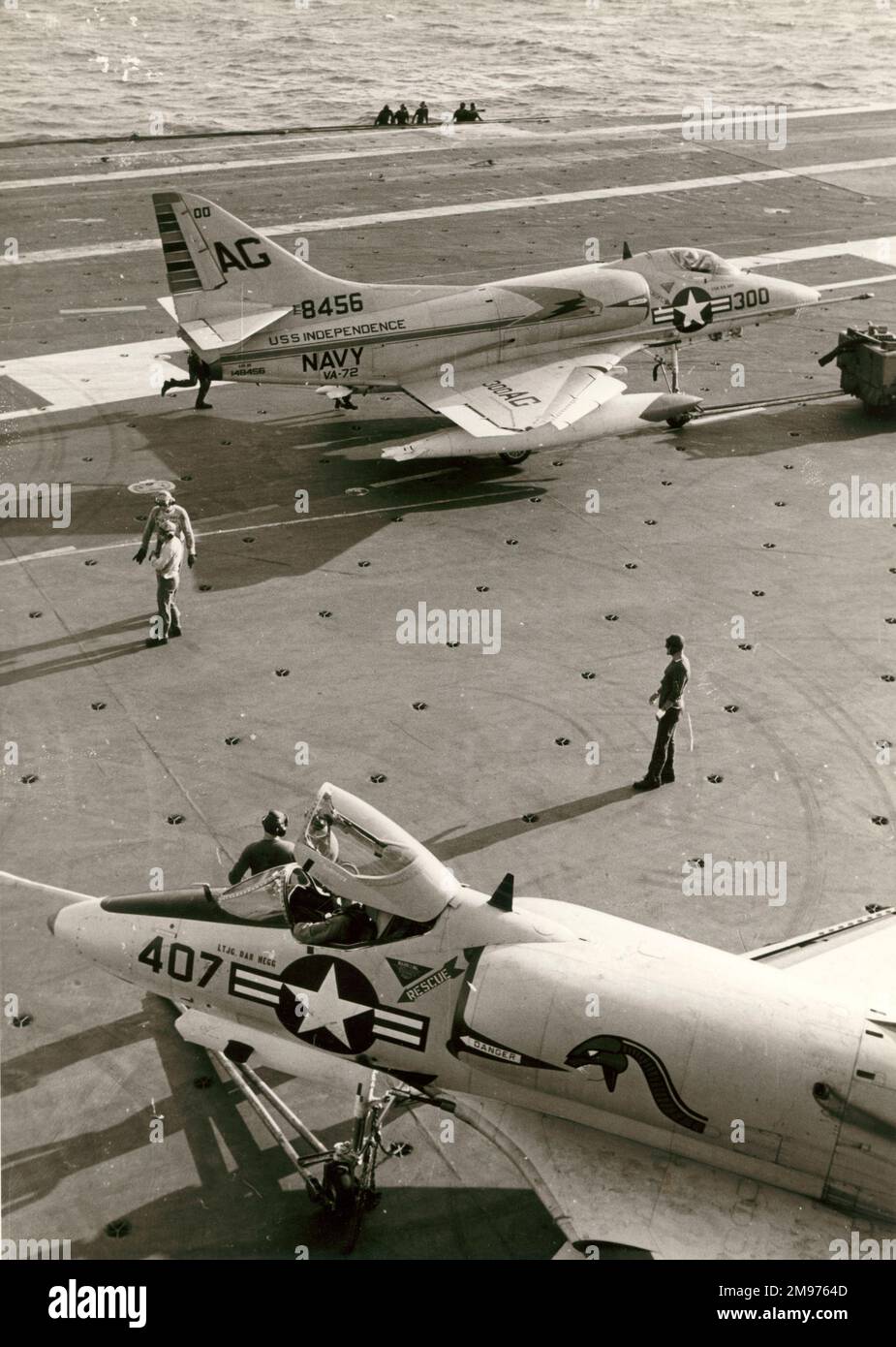 Two Douglas A-4C Skyhawks, including 148456, aboard USS Independence. Stock Photo