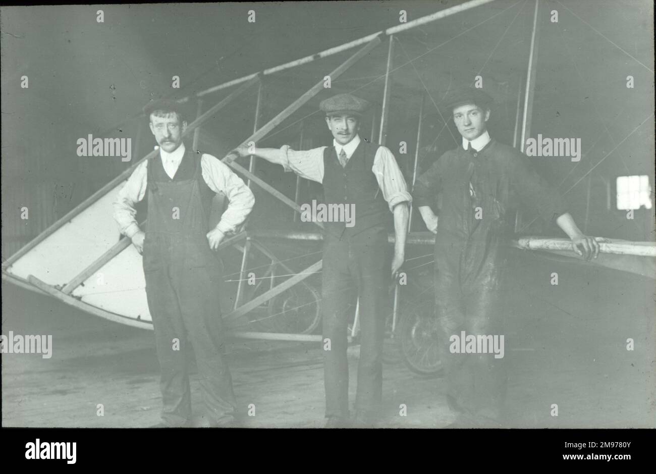 Alec Ogilvie’s mechanics with his modified Short Wright biplane. Stock Photo