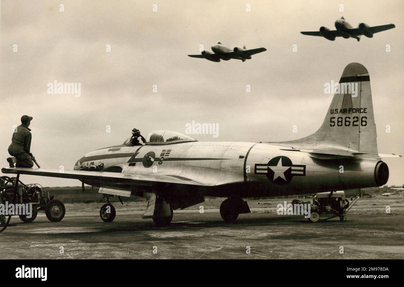 Lockheed P-80B-1-LO Shooting Star, 45-8626, overflown by two Gloster Meteor F4s. Stock Photo