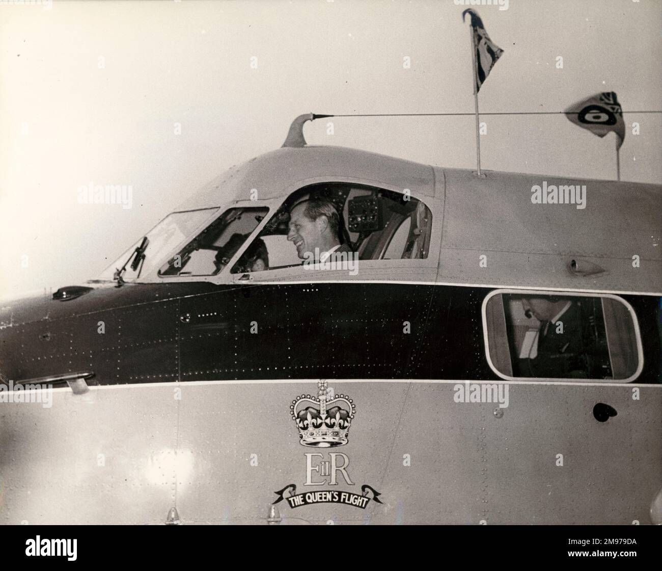 HRH The Prince Philip, Duke of Edinburgh, KG, HonFRAeS, RAeS Honorary President 1966, in a Heron of the Queen’s Flight. Stock Photo