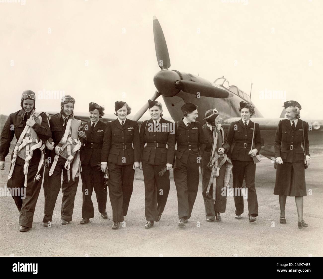 American and British members of the Air Transport Auxiliary in front of a Hawker Hurricane. From left: Virginia Farr, New Jersey; Louise ‘Dutch’ Schuuman, New York; Helen Ritchie, Pittsburgh; Pauline Gower, Commander; Jacqueline Cochran; Pamela Duncan, UK; Mrs D. Williams, UK; Zita Irwin, UK and Audrey Sale-Barker. Stock Photo