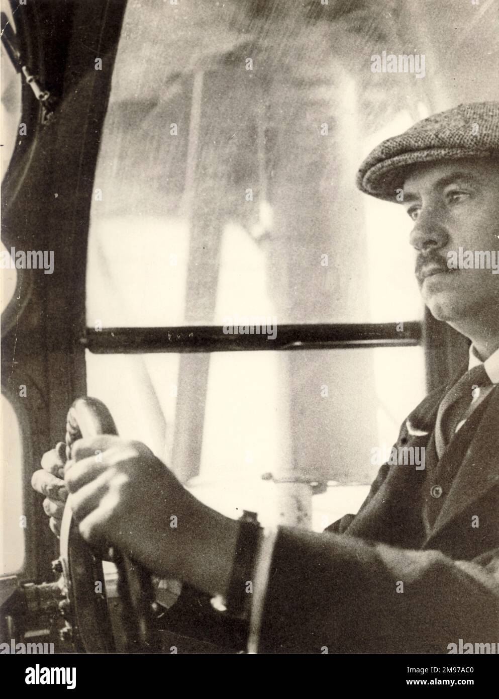 Igor Ivanovich Sikorsky, 1889-1972, at the controls of an S-38 during a flight over Panama. January 1931. Stock Photo