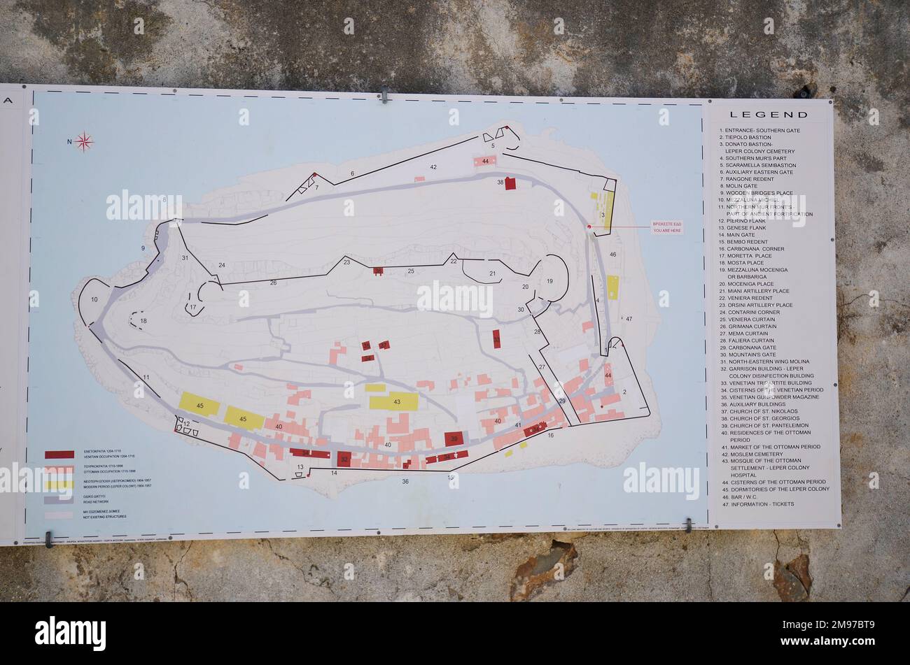 Spinalonga, Crete, Greece - October 10, 2022: Map and legend of the old Venetian Fortress Spinalonga, until 1957 used as a leper station, now a popula Stock Photo