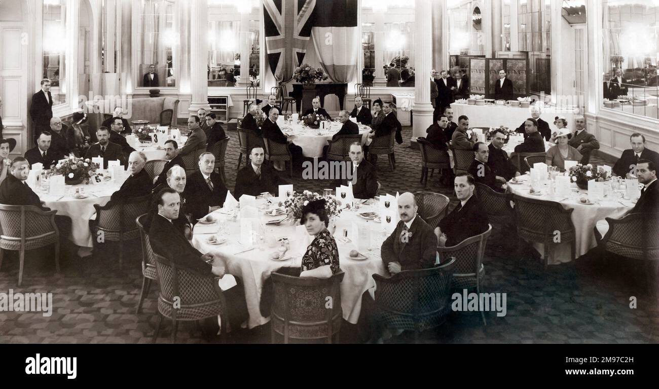 Dinner given by Alexander Duckham at the Savoy Hotel honouring Louis Blériot on the 25th anniversary of his cross-Channel flight. 25 July 1934. Table 2: Sir Alan Anderson, Capt J. Gordes, Mrs J.E. Duckham, Mrs C.H. Queen, Sqn Ldr de Haga Haig, G.P. Olley, Flt Lt K.O. Prestor and Sir Alliot Verdon Roe. Table 4: Marquis of Clydesdale, G.M. Cox, J.E. Duckham, Capt A.G. Longdon, Capt N. Yachlan, Rev D. Robins, Mme Albert Siret and L.A. Winefield. Table 6: R. Beaumont, Dr A. Penrhyn Bowdler, Sir Christopher Bullock, Major F.T. Digby, E.H. Lawford, Mme Andre Rubel, Lord Sempill, Capt R.P. Stocker Stock Photo