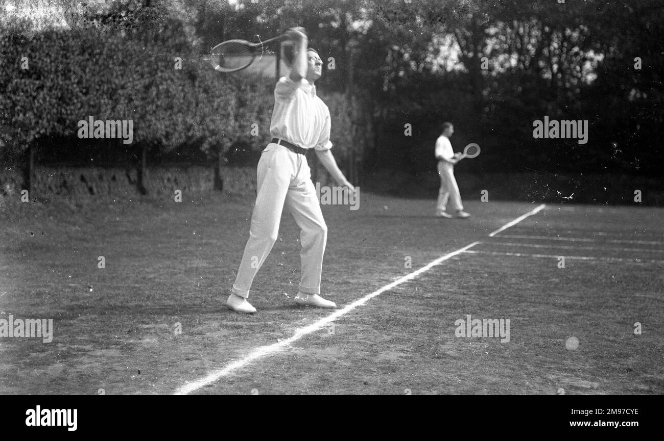 Tennis players on court at Moorfield Tennis Club Stockport, showing