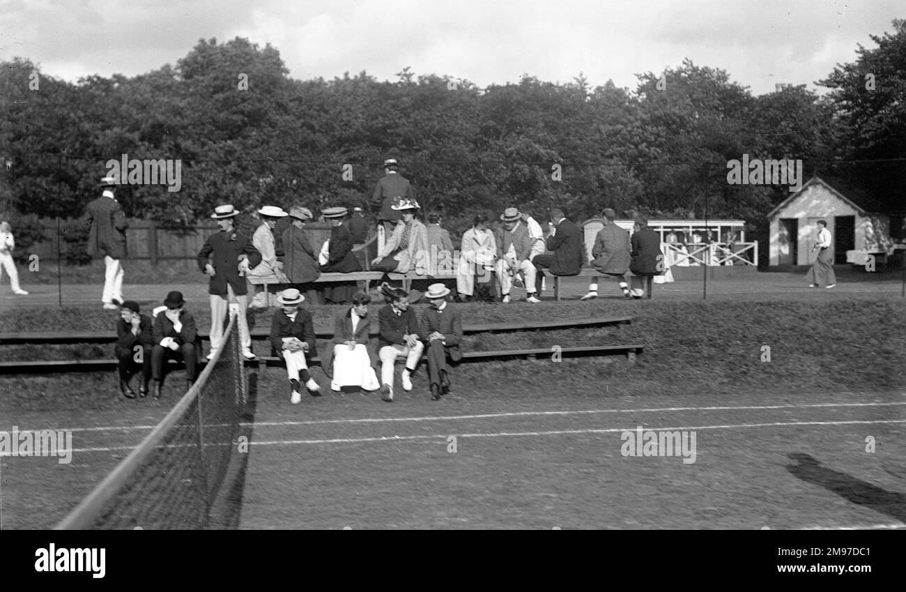 Edwardian tennis spectators showing styles and demeanour of the period Stock Photo