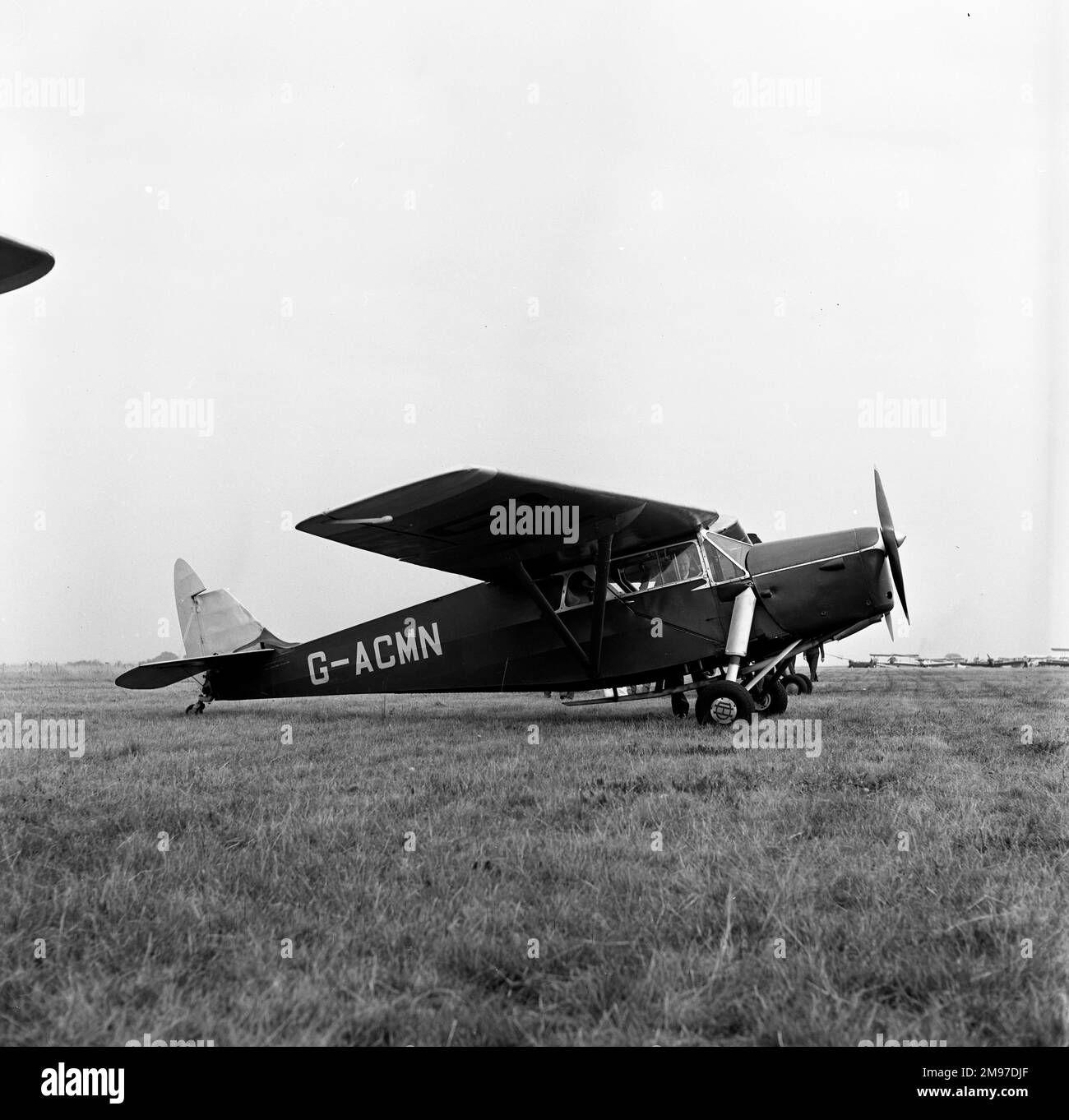 De Havilland Leopard Moth G-ACMN privately-owned at Blackbushe on 6 October 1962 Stock Photo
