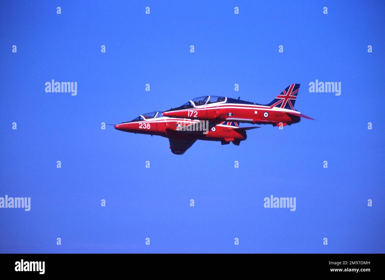 2 BAe Systems Hawks from 4 Flying Training School at Valley display at RAF Alconbury in August 1987.  Aircraft have Union Jack tails Stock Photo