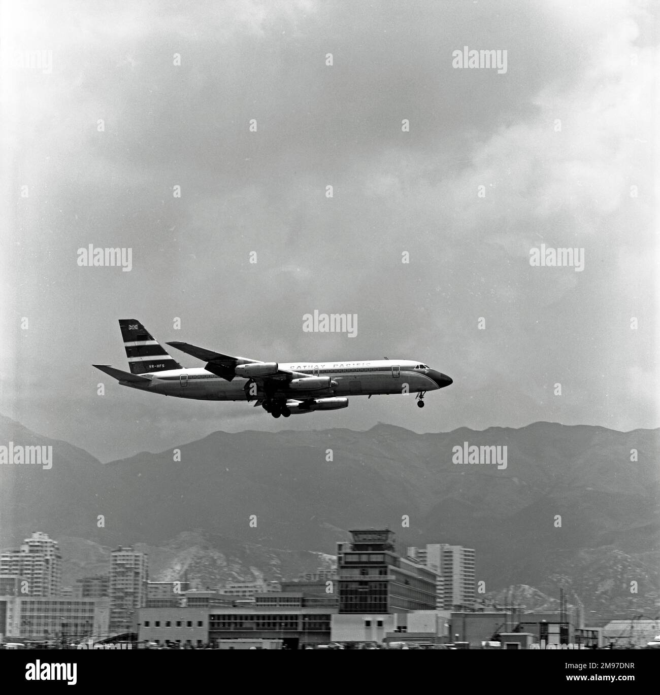 Convair CV880M VR-HFS of Cathay Pacific landing at Hong Kong on 17 May 1962 Stock Photo