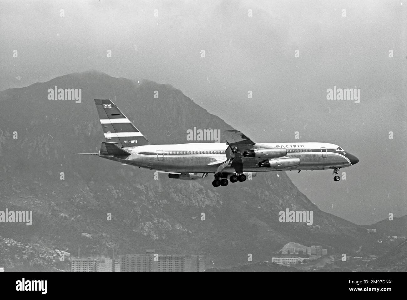 Convair CV880M VR-HFS of Cathay Pacific landing at Hong Kong on 20 November 1969 Stock Photo