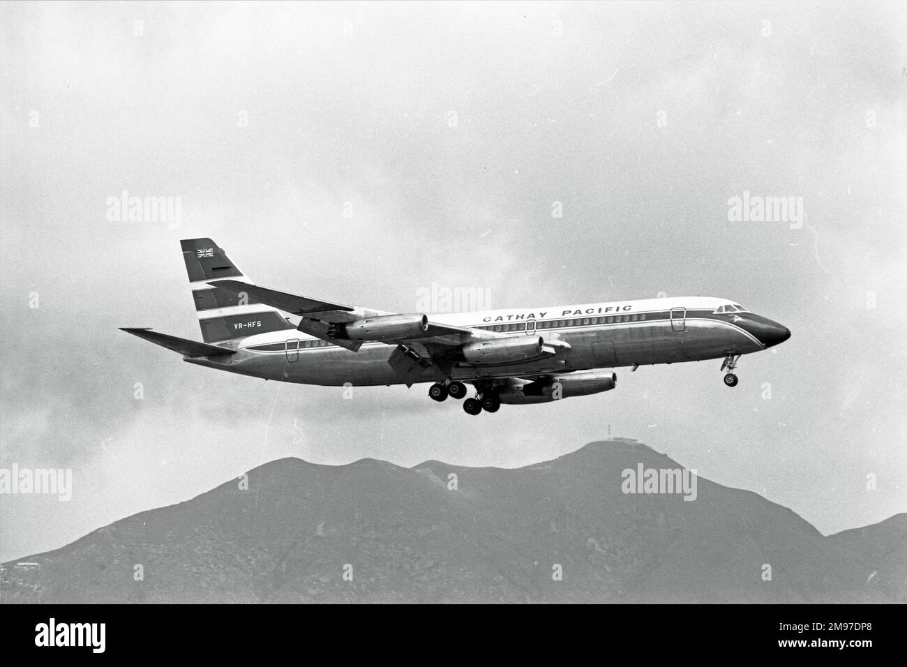 Convair CV880M VR-HFS of Cathay Pacific landing at Hong Kong on 20 November 1969 Stock Photo