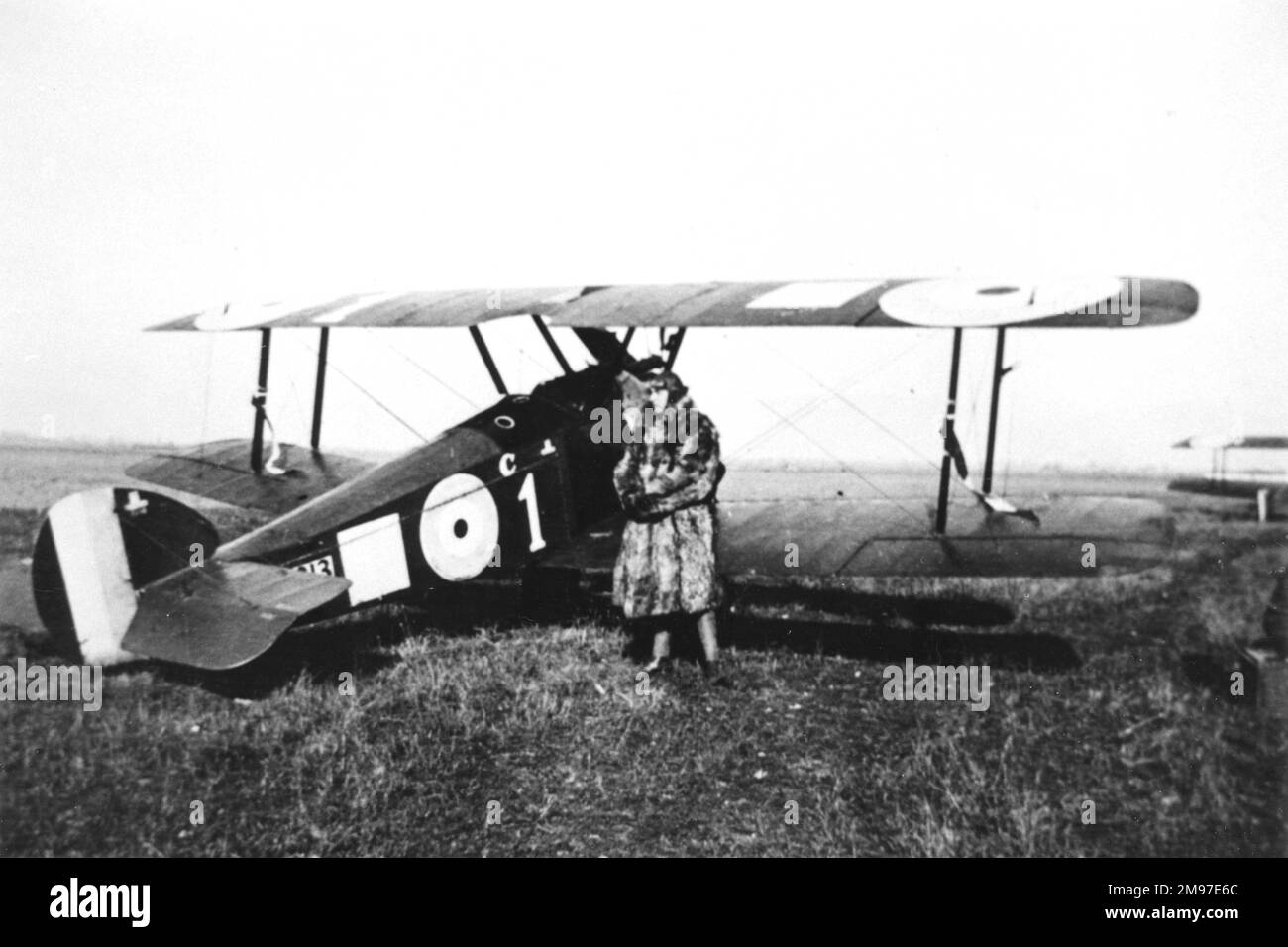 William George 'Billy' Barker (1894-1930), Canadian member of No. 9 Squadron, RFC, seen here wearing a fur coat, standing by his Sopwith Camel.  His confirmed victories totalled 50.  He received many awards, including the VC, the DSO, the MC and the Croix de Guerre. Stock Photo