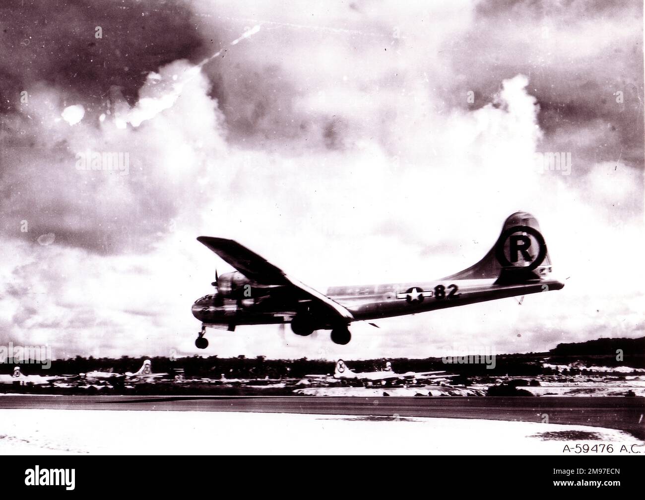 Boeing B-29 'Enola Gay' landing back on Tinian-Marianas after Hiroshima raid, 5 Aug 1945. Stock Photo