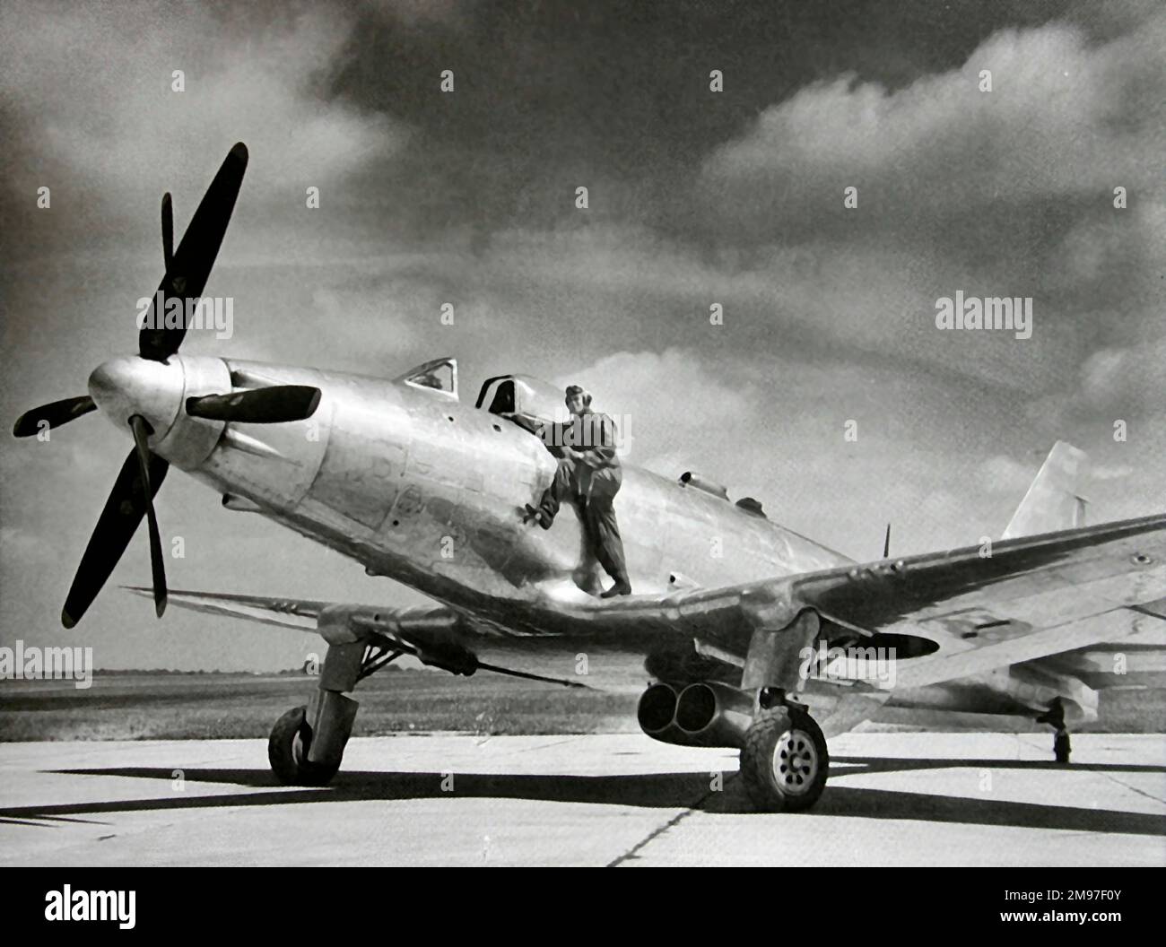 Fisher XP-75A -seen with Allison's test pilot, BT 'Red' Hulse First flown in November 1943, only 13 of these experimental interceptors were built. Stock Photo