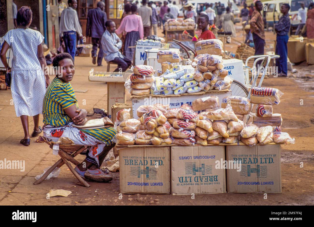 Uganda, Kampala; woman selling bread at street market Stock Photo Alamy