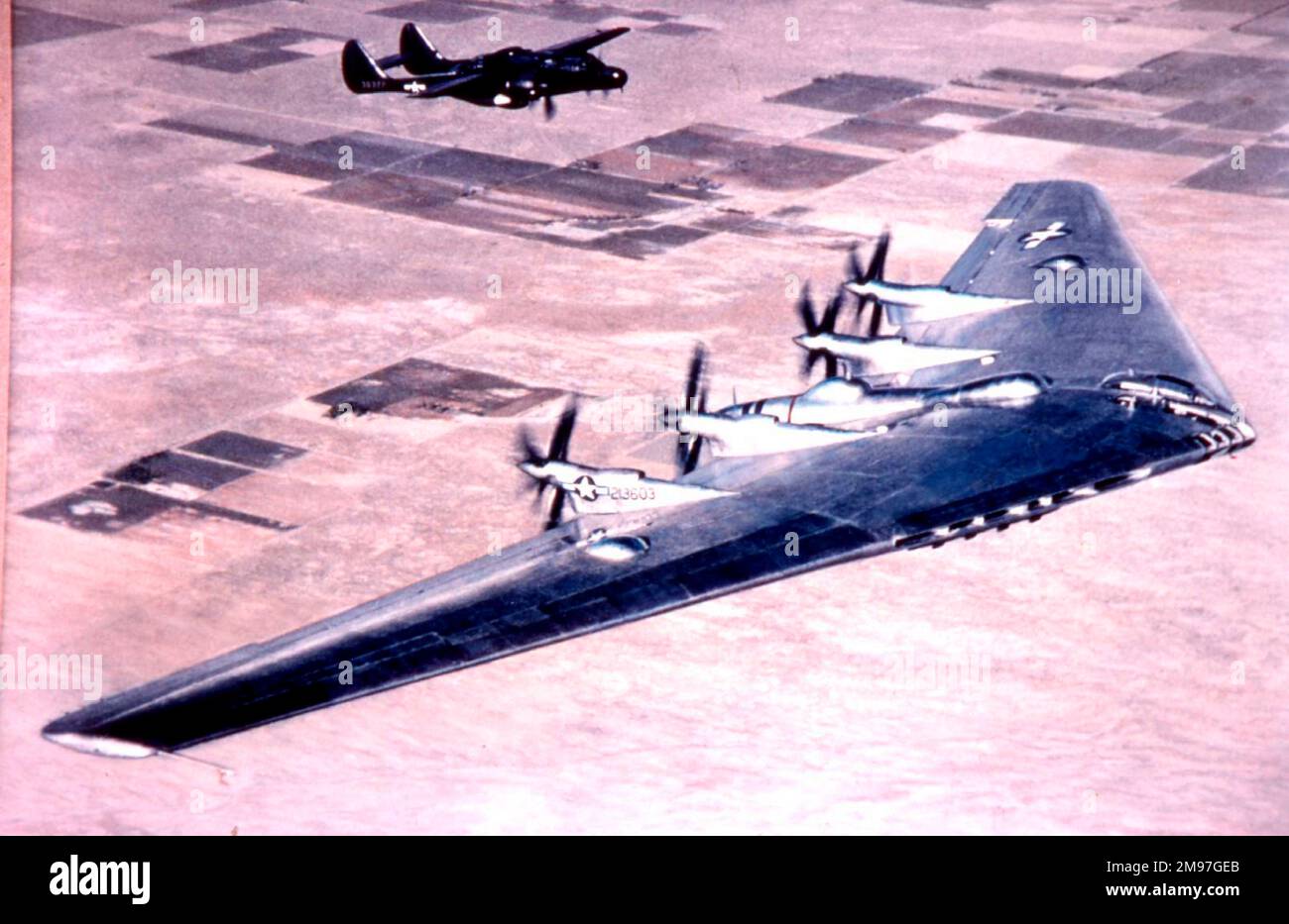 Northrop XB-35 -seen with a P-61, this all-wing bomber, ordered in November 1941, did not fly until June 1946. Stock Photo