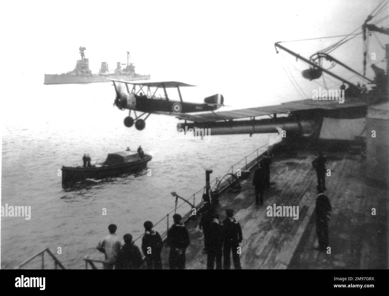 Sopwith 1.5 Strutter single-seat bomber of the RNAS, taking off from a warship's gun platform. Stock Photo