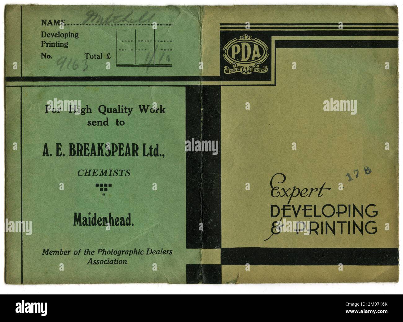 Photographic film wallet from A E Breakspear Ltd of Maidenhead, members of the Photographic Dealers Association. The customer's name is Mitchell and the cost of developing is one shilling and tenpence. Stock Photo