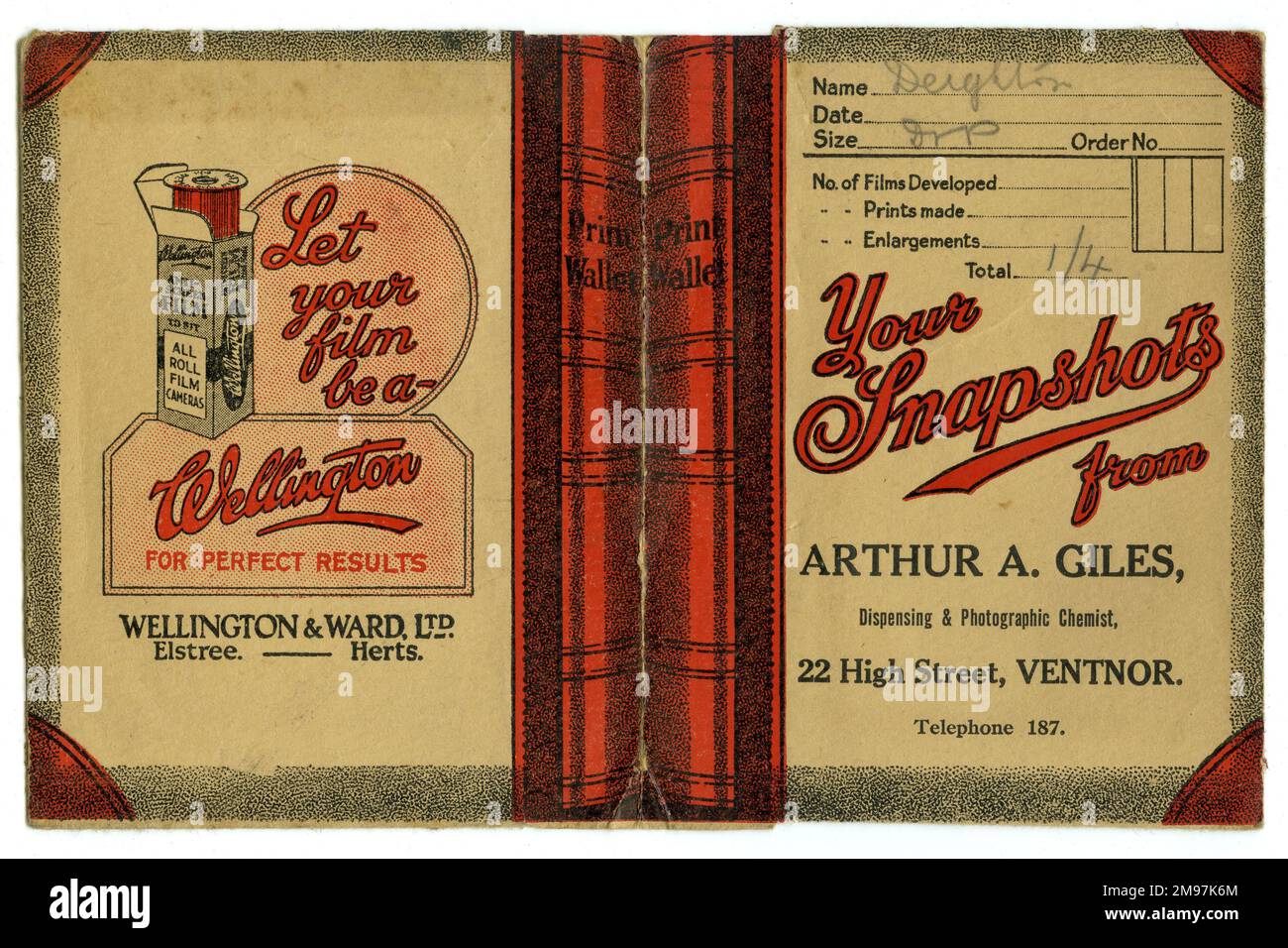 Photographic print wallet, advertising film from Wellington & Ward Ltd of Elstree, Hertfordshire. Photographs developed by Arthur A Giles, High Street, Ventnor, Isle of Wight. The customer's name is Deighton and the cost of developing is one shilling and fourpence. Stock Photo