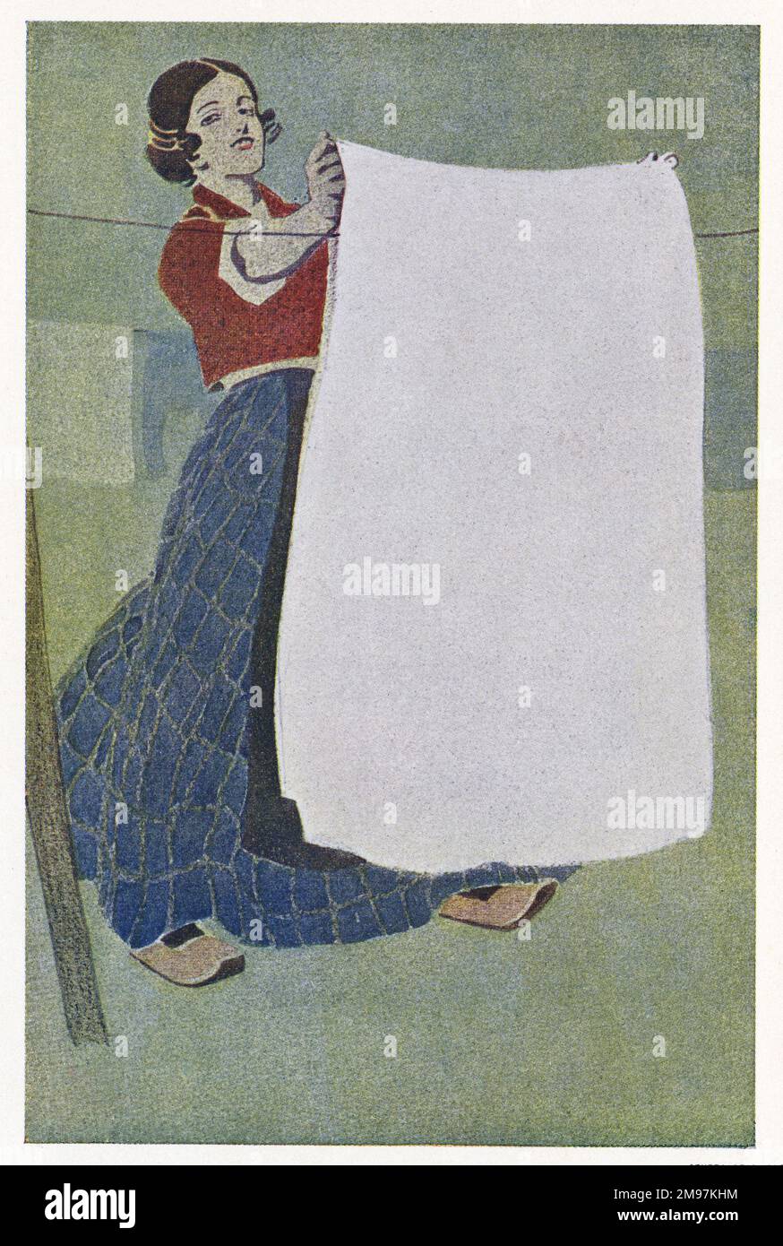 German poster design, a Dutch woman hanging out washing. Stock Photo
