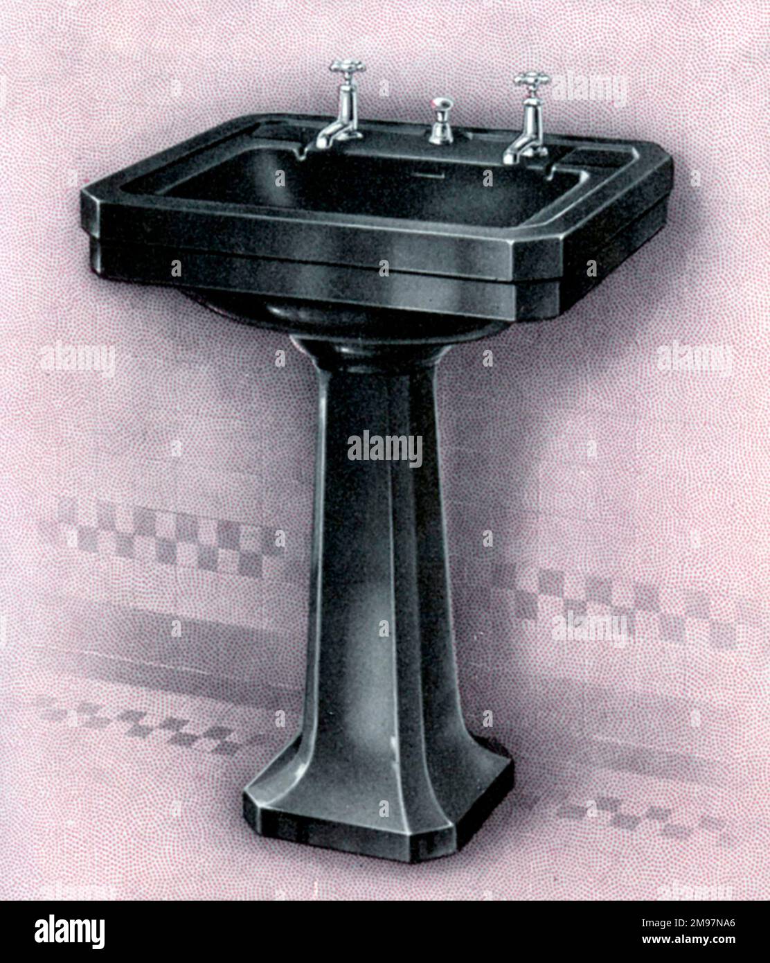 'Vitramant' Coloured Pedestal Lavatory (washbasin) finished in black enamel. Stock Photo
