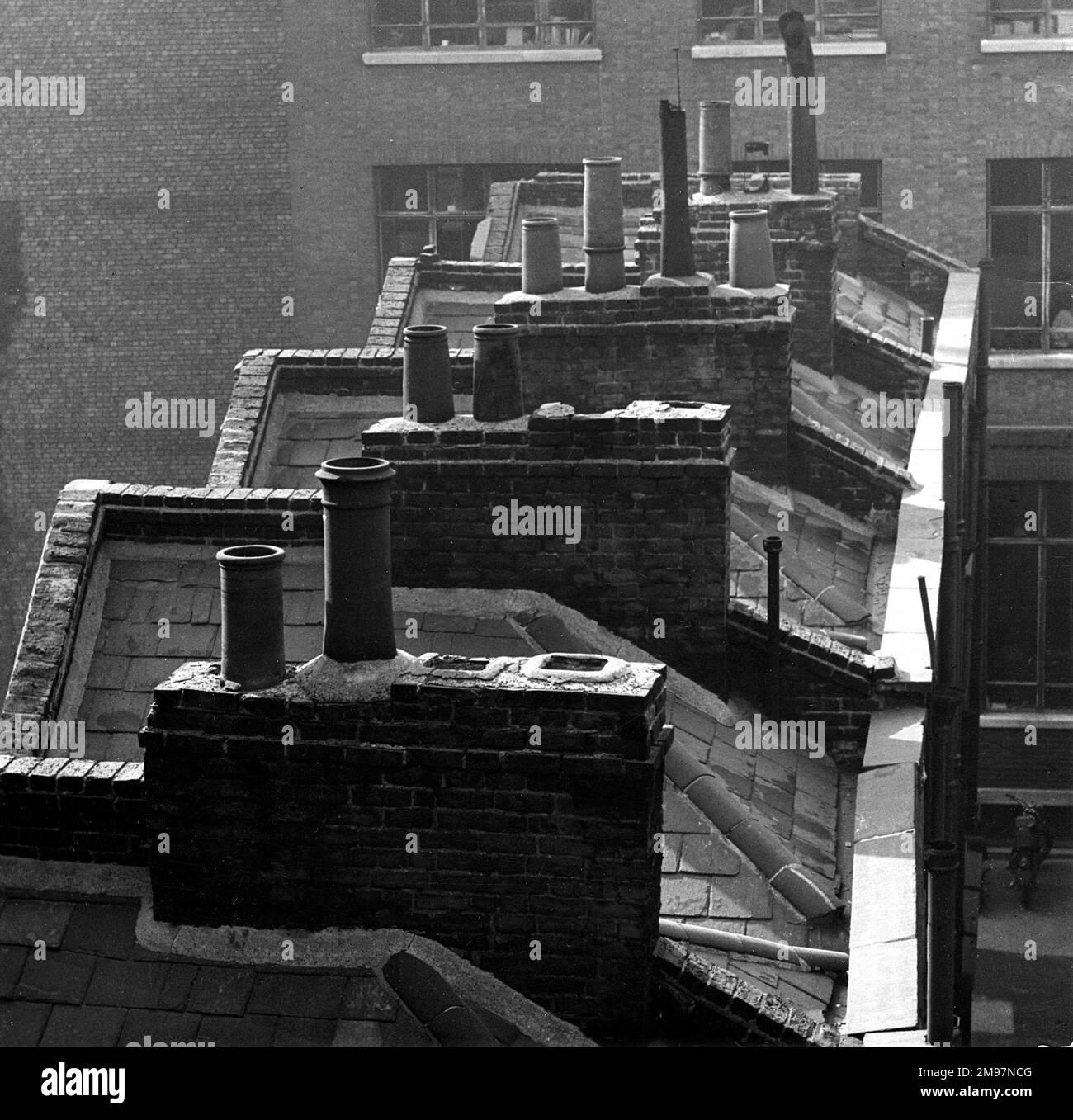 Rooftops and chimney pots, Wrestler's Court, London. Stock Photo