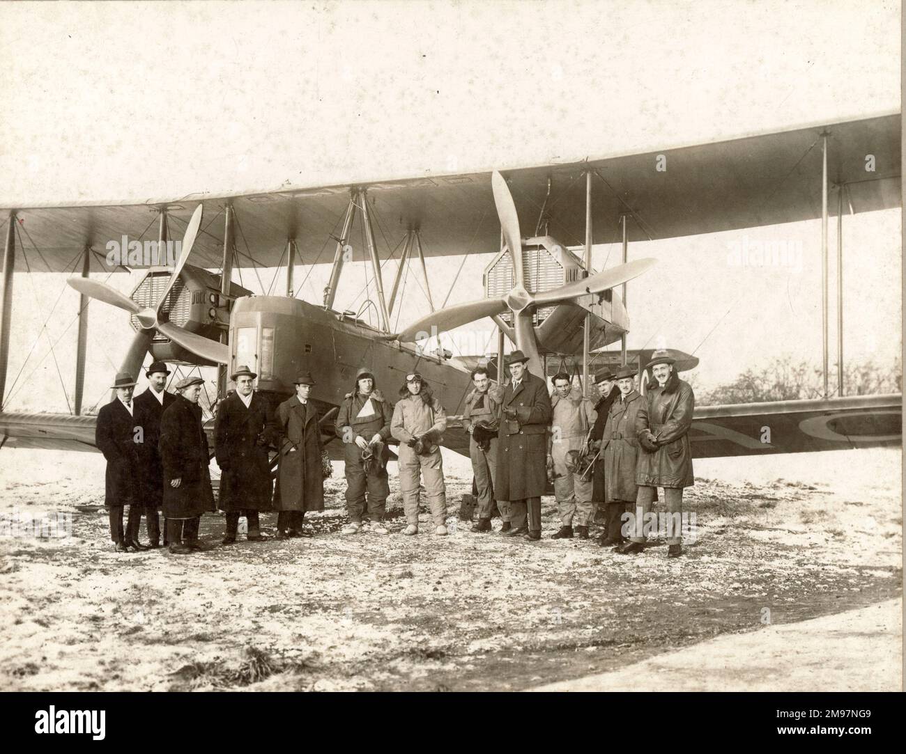 The start of the England to Australia flight from Hounslow Aerodrome, London, 12 November 1919. In flying clothing (from left) Ross Smith, Keith Smith, Sergeant J.M. (Jim) Bennett and Sergeant W.M. (Wally) Shiers. Between Sgts Bennett and Shiers is R.K. Pierson who designed the Vimy. Stock Photo