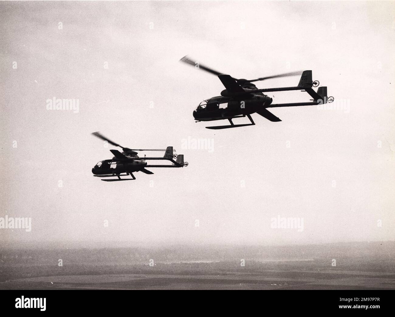 The two McDonnell XV-1s, 53-4016 and 53-4017, in flight. Stock Photo