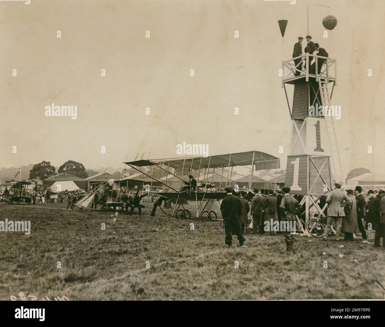 Start of the speed handicap final at the aerial derby, Hendon, 8 June 1912. From left: Cody (Michelin Cup Biplane), Raynham (ABC Burgess-Wright) and Turner (Grahame-White Biplane). Stock Photo