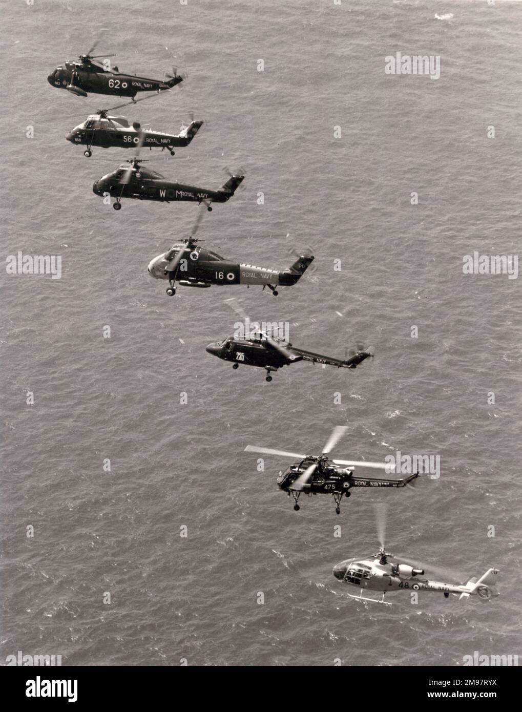 Royal Navy helicopters photographed off Portland. From top: Westland Sea King, Westland Wessex HAS1, Westland Wessex HU5, Westland Wessex HAS1, Westland Lynx, Westland Wasp HAS1 and Westlad Gazelle. c.July 1975. Stock Photo
