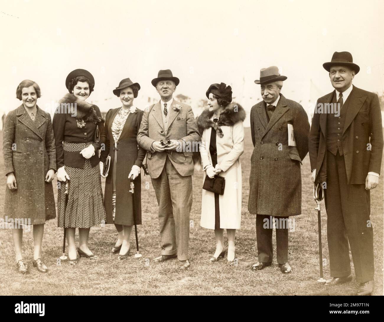 The 1938 Royal Aeronautical Society Garden Party at the Fairey Aviation Aerodrome, Great West Road, Hayes, Middlesex. From left: The Misses Mary, Anne and Elizabeth Handley Page, Sir Harry Brittain, Mrs Handley Page, the Belgian Ambassador and Mr Frederick Handley Page. Stock Photo