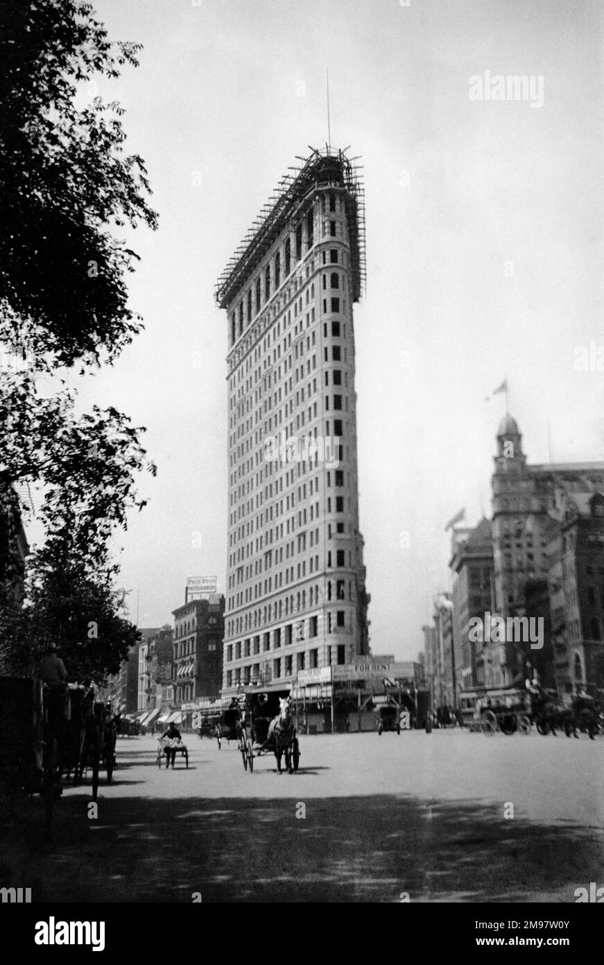 Originaly named The Fuller Building upon its completion  in 1902. Now reconised as the Flatiron building due to it resemblance to a cast iron cloths iron. The building became a designated New York land mark in 1966, later in 1989 a national historic land mark. Stock Photo