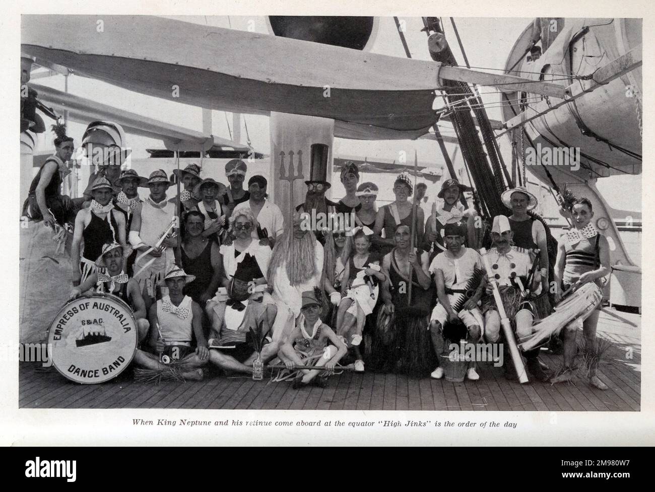 Dance Band members on the Canadian Pacific cruise liner, Empress of Australia.  They are wearing fancy dress, as part of the High Jinks tradition performed when crossing the Equator. Stock Photo