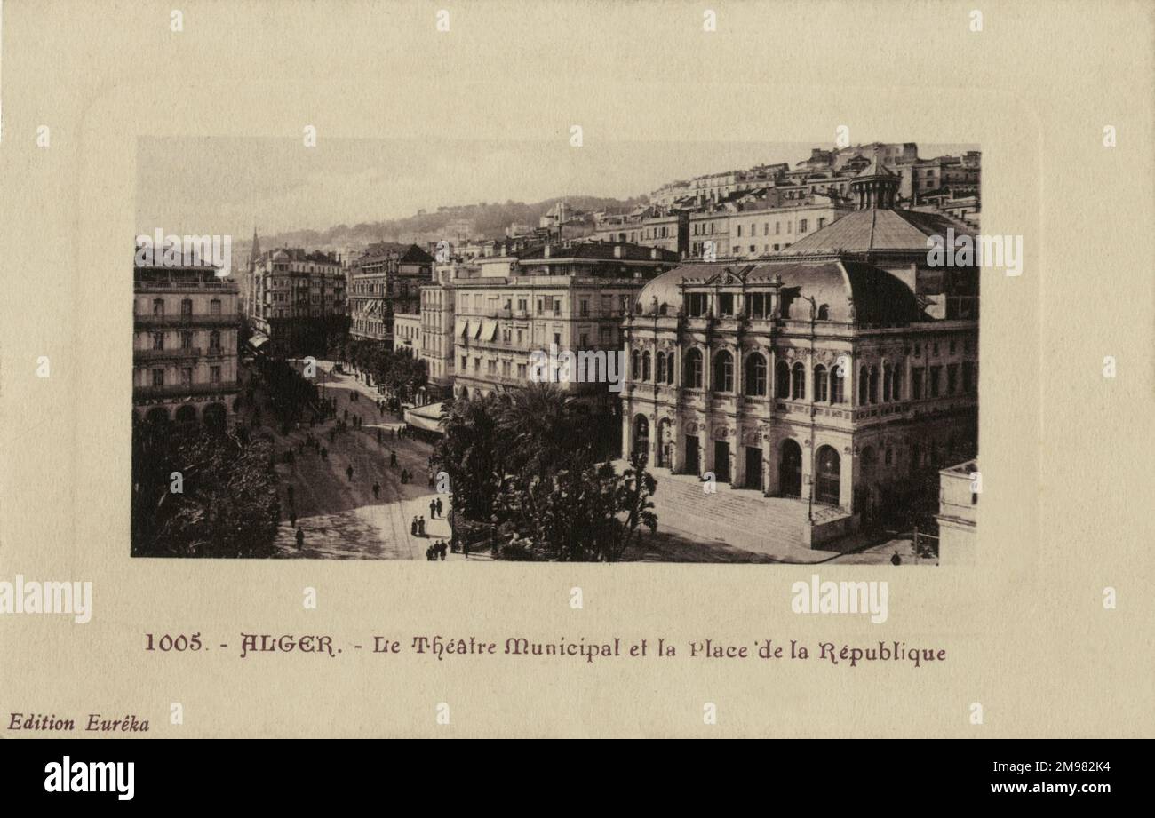 The municipal theater and the Place de la République, Algiers. Many figures stroll around the square, which is lined with buildings in French colonial style (the foremost building being leading theater of Algiers). Stock Photo