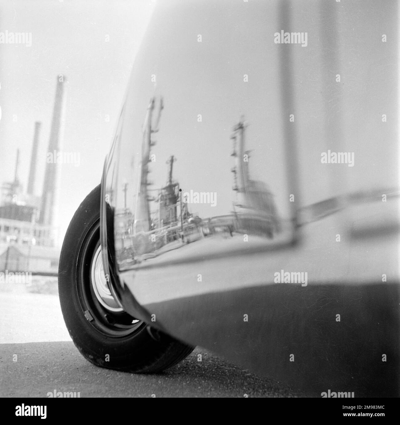Advertisement for Esso Petroleum -- reflections on car bodies at Fawley Refinery, Hampshire. Stock Photo