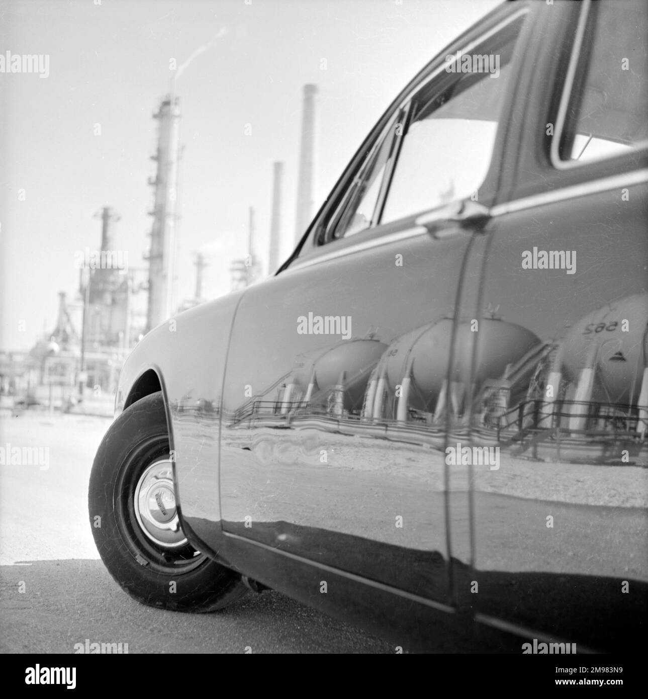 Advertisement for Esso Petroleum -- reflections on car bodies at Fawley Refinery, Hampshire. Stock Photo