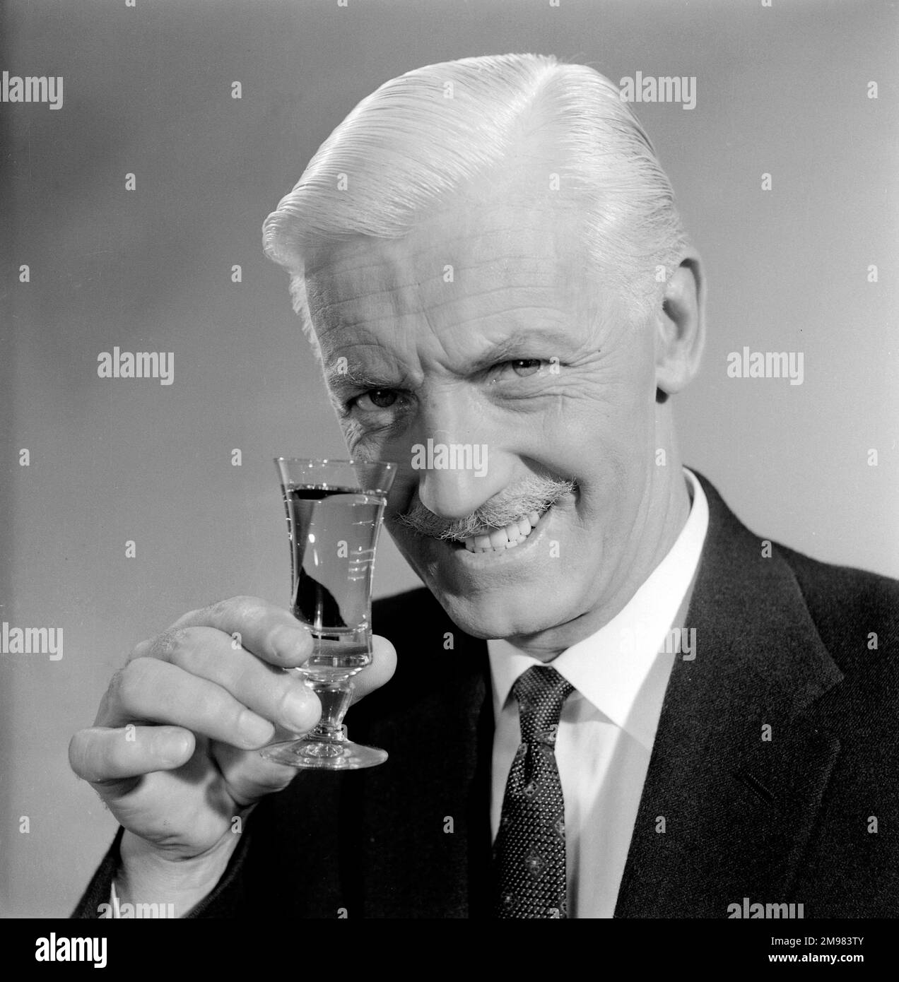 Advertisement for Emu sherry -- smiling male model (George McGrath ...