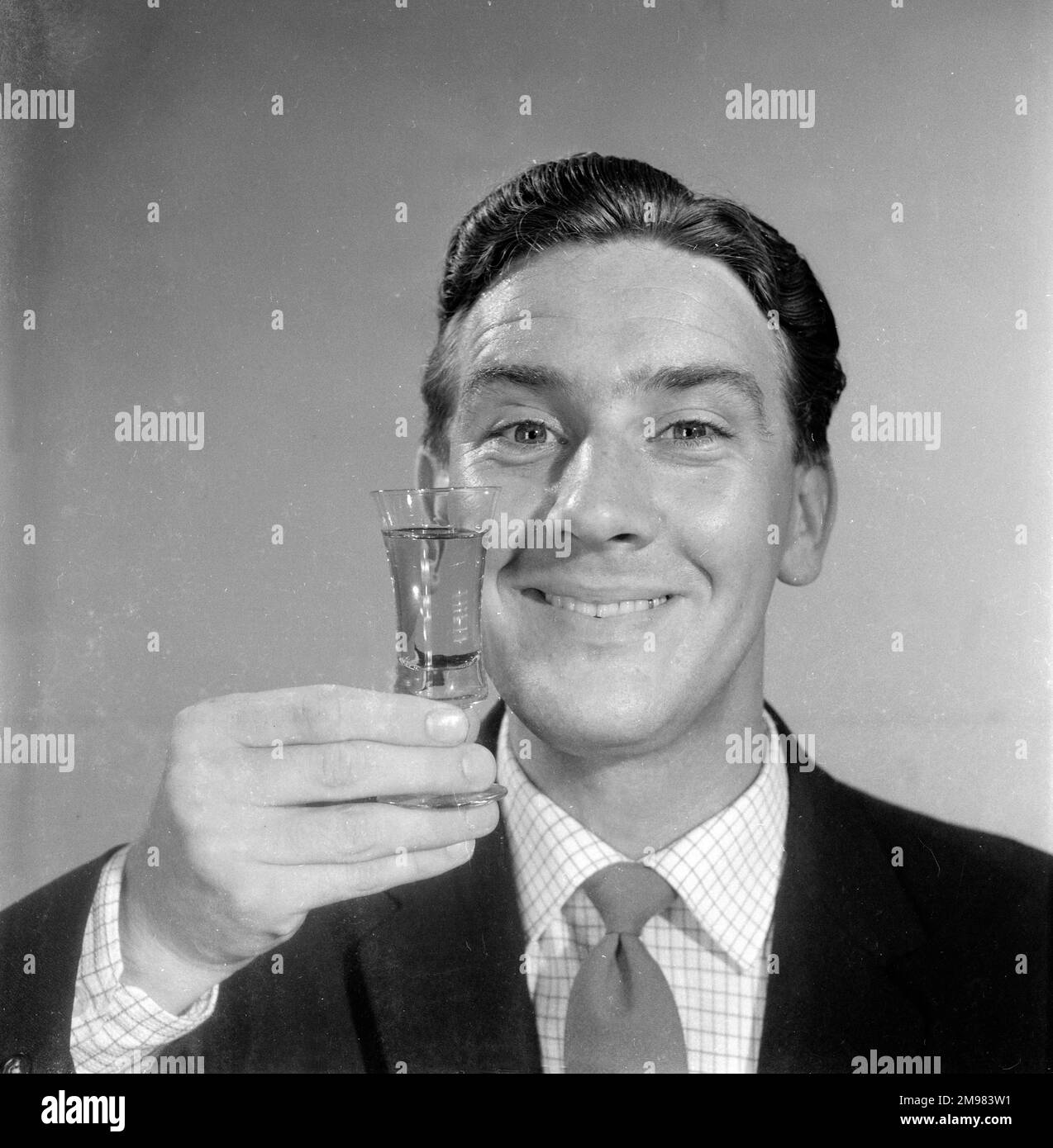 Advertisement for Emu sherry -- smiling male model (Stanley Morgan ...