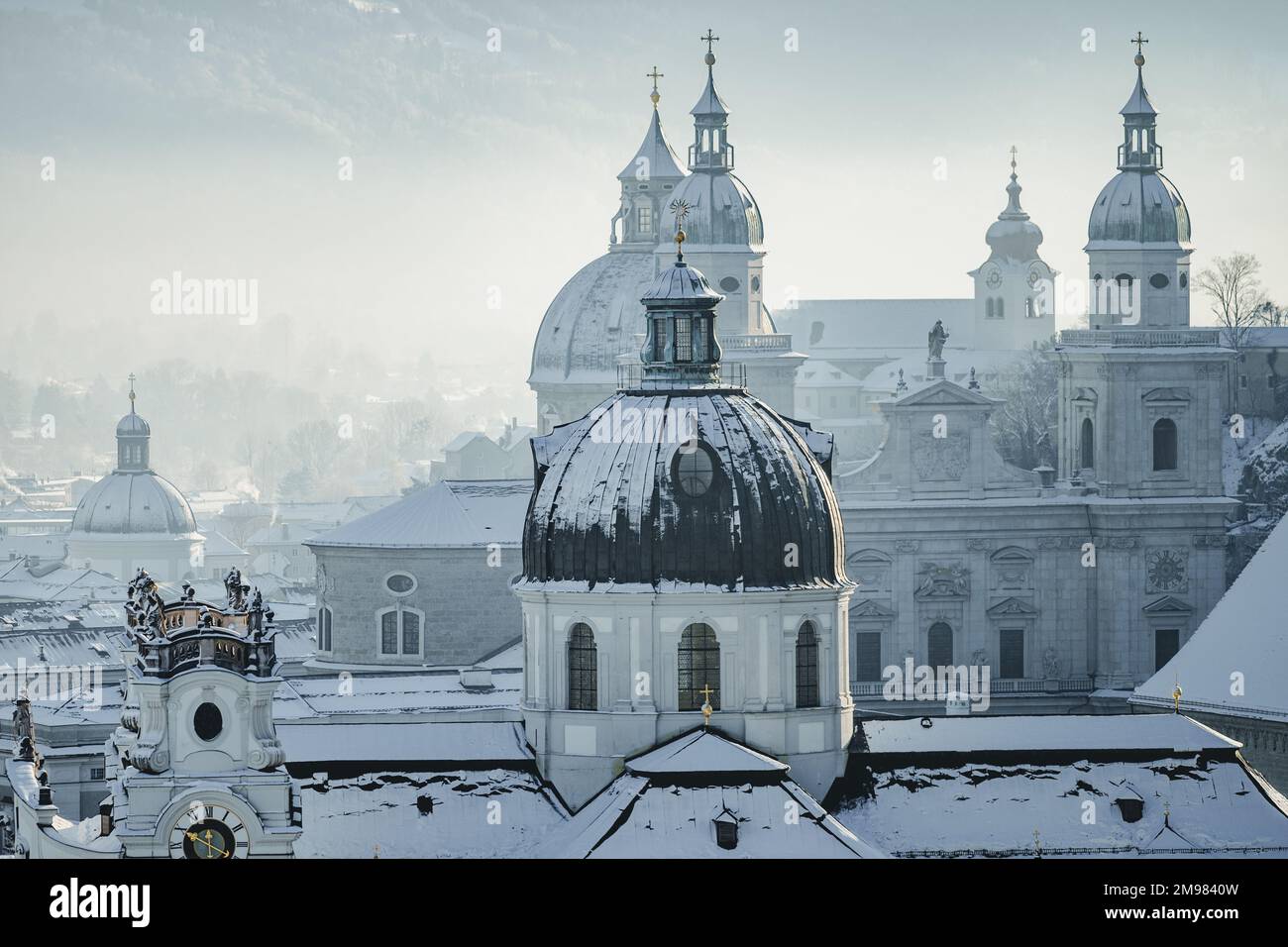 Salzburg Cathedral and city skyline in winter snow, Salzburg, Austria Stock Photo