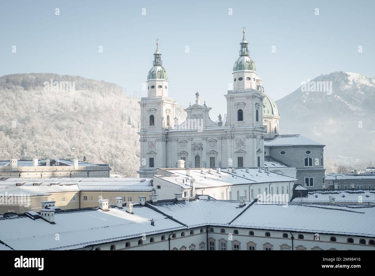 Salzburg Cathedral and cityscape in the snow, Salzburg, Austria Stock Photo