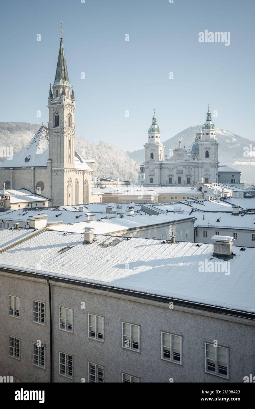 Salzburg Cathedral and city skyline in winter snow, Salzburg, Austria