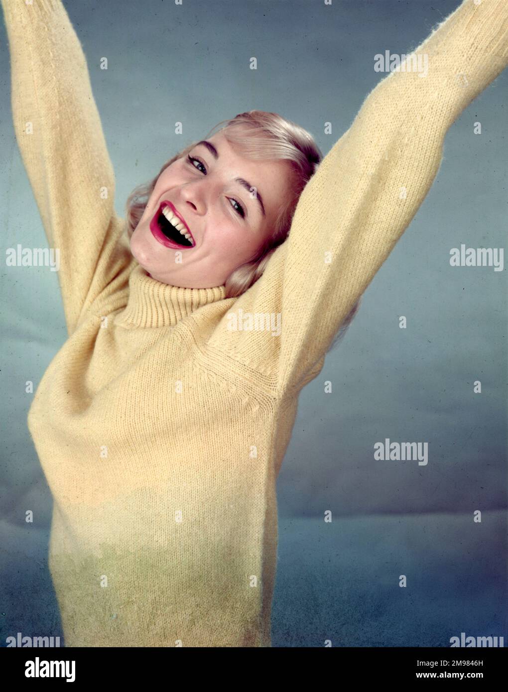 Advertisement for Pepsodent toothpaste female model wearing a yellow